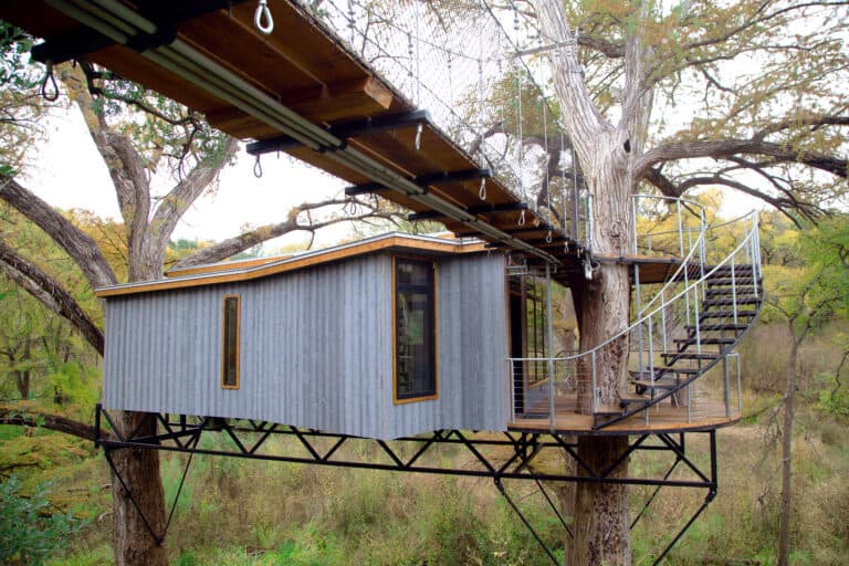 Steel Clad 350 Sq. Ft. Modern Cabin on Stilts with Shutters